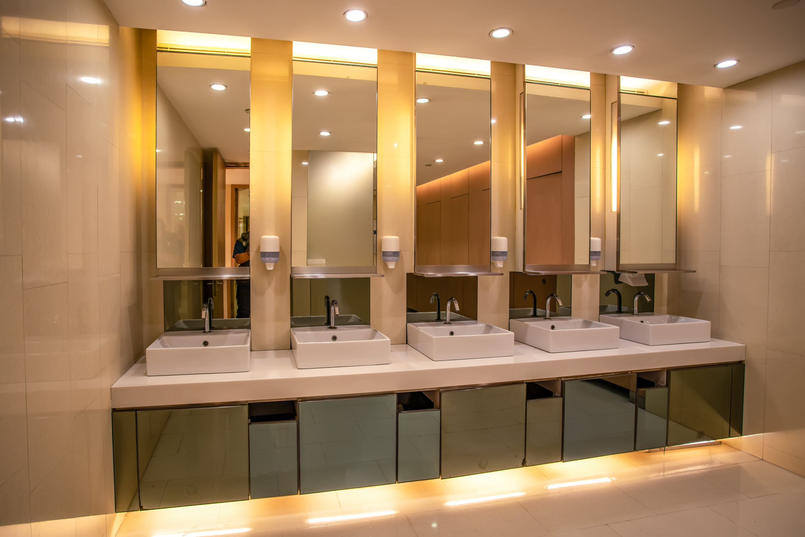 Interior view of modern clean bathroom in mall Interior view of modern clean bathroom in mall
